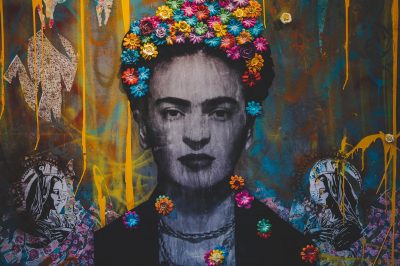 creative graffiti wall with portrait of frida kahlo